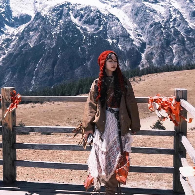 Autumn And Winter Warm Wool Hat Hand-Woven Hollow Bag Hat Women'S Ethnic Style Fringed Ear Protector Knitted Hat