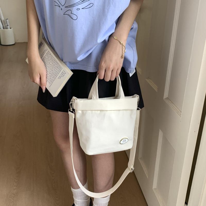 Casual Canvas Portable Bucket Bag New Go Out Solid Color Shoulder Niche Design Shoulder Small Satchel