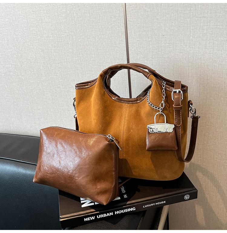 Retro suede portable bucket bag women's 2025 new fashion high-end sense child and mother bag commuter shoulder messenger bag