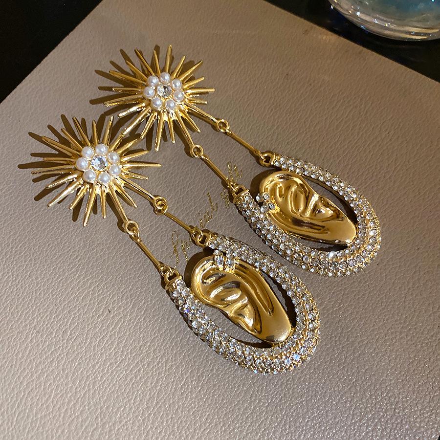 

Silver needle diamond-encrusted pearl sun ear earrings exaggerated exquisite fashion stud earrings light luxury high-end earrings