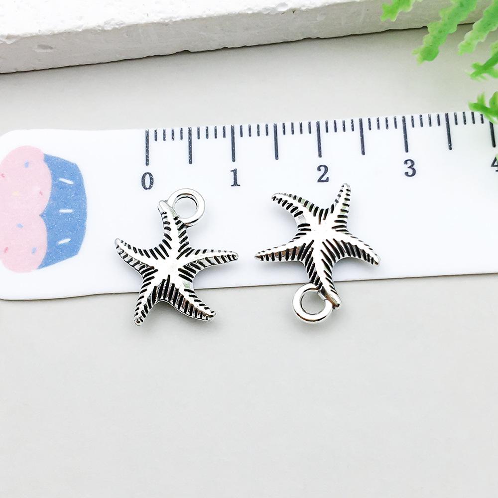 Set di 100 Ciondoli Gatto Farfalla Luna Argento Antico per Braccialetti e Collane Fai da Te
