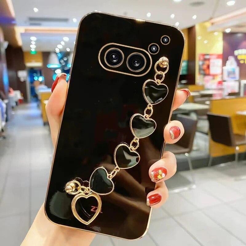 

For Nothing Phone 2A Модный чехол с браслетом-цепочкой с покрытием Love Heart для телефона For Nothing Phone 2A 2 1 Мягкая силиконовая противоударная задняя крышка Nothing Phone 2A чёрный