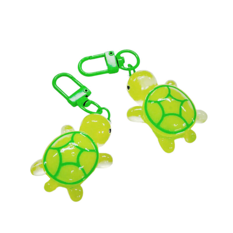 Glow-in-the-dark turtle lucky keychain mini boogie bag chaki keychain