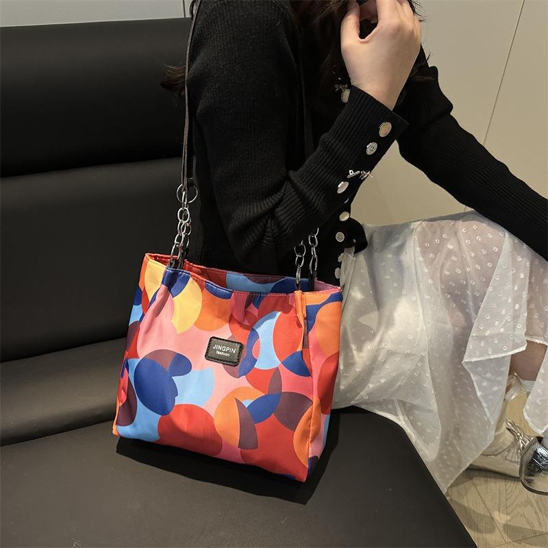 Personality trend Spring and summer new fashion contrasting colors women's large capacity shoulder underarm portable tote bag
