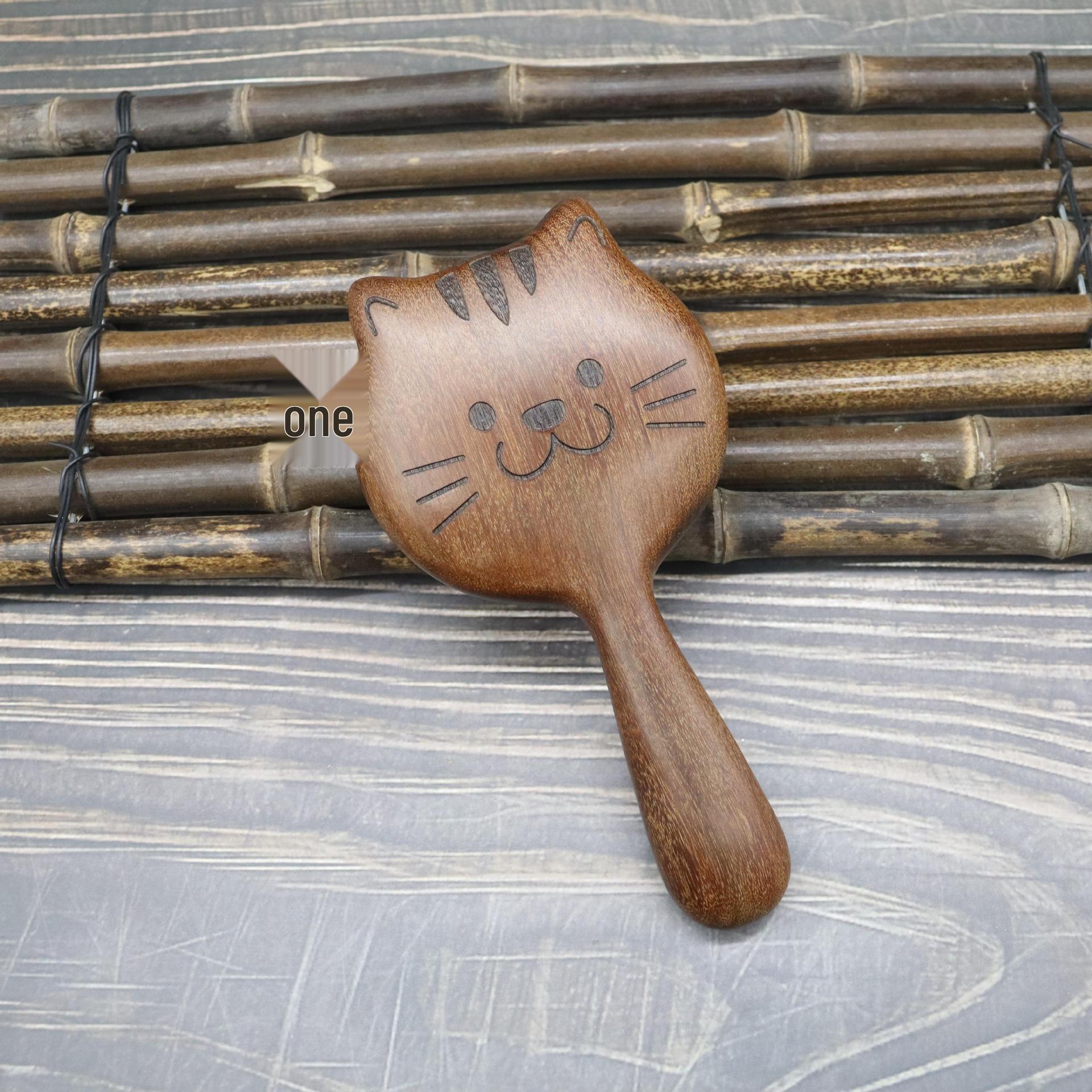 

Golden Sandalwood Cartoon Cat Air Cushion Massage Comb - Portable & Cute