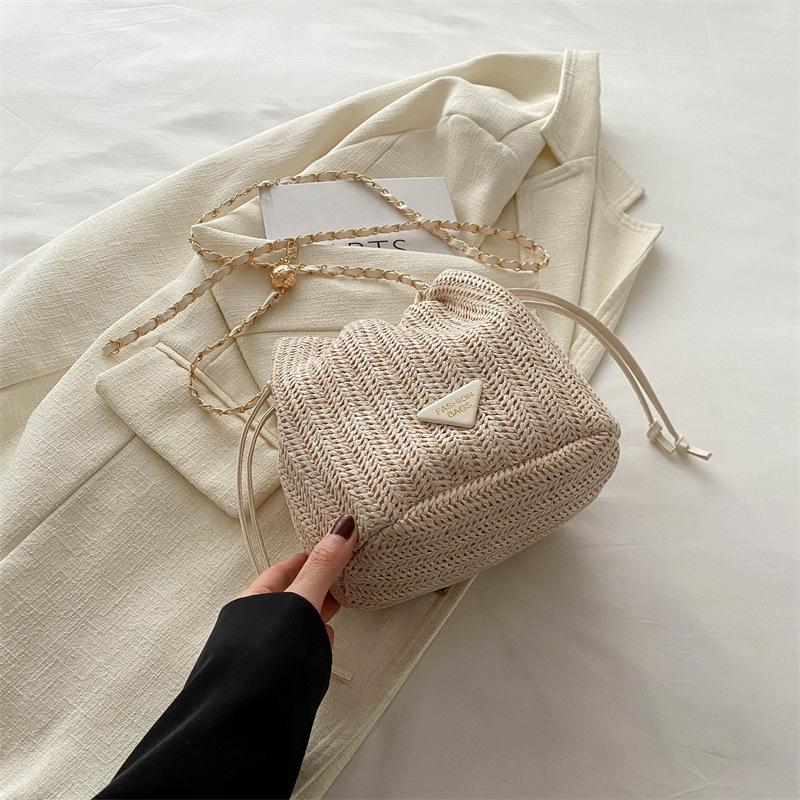 Drawstring fashion Korean version casual bag 2025 spring and summer new foreign style shoulder messenger bag straw bucket bag women's bag tide