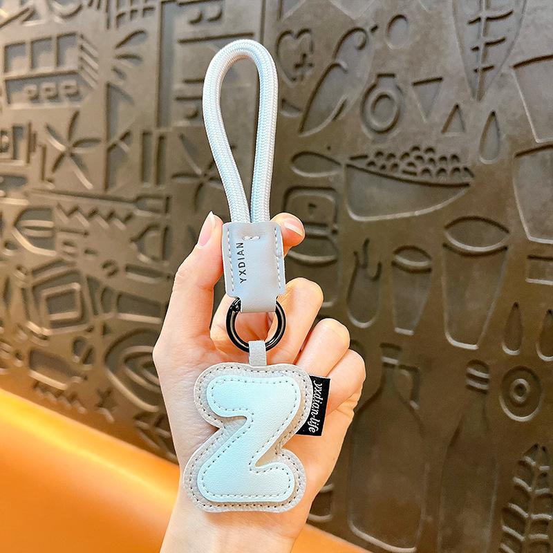 

26 English letter keychain cute creative bag leather pendant couple schoolbag car key chain lanyard jewelry
