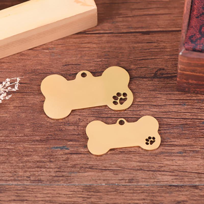 Stainless Steel Hollow Bone Pet Tag with Engraved Dog Paw