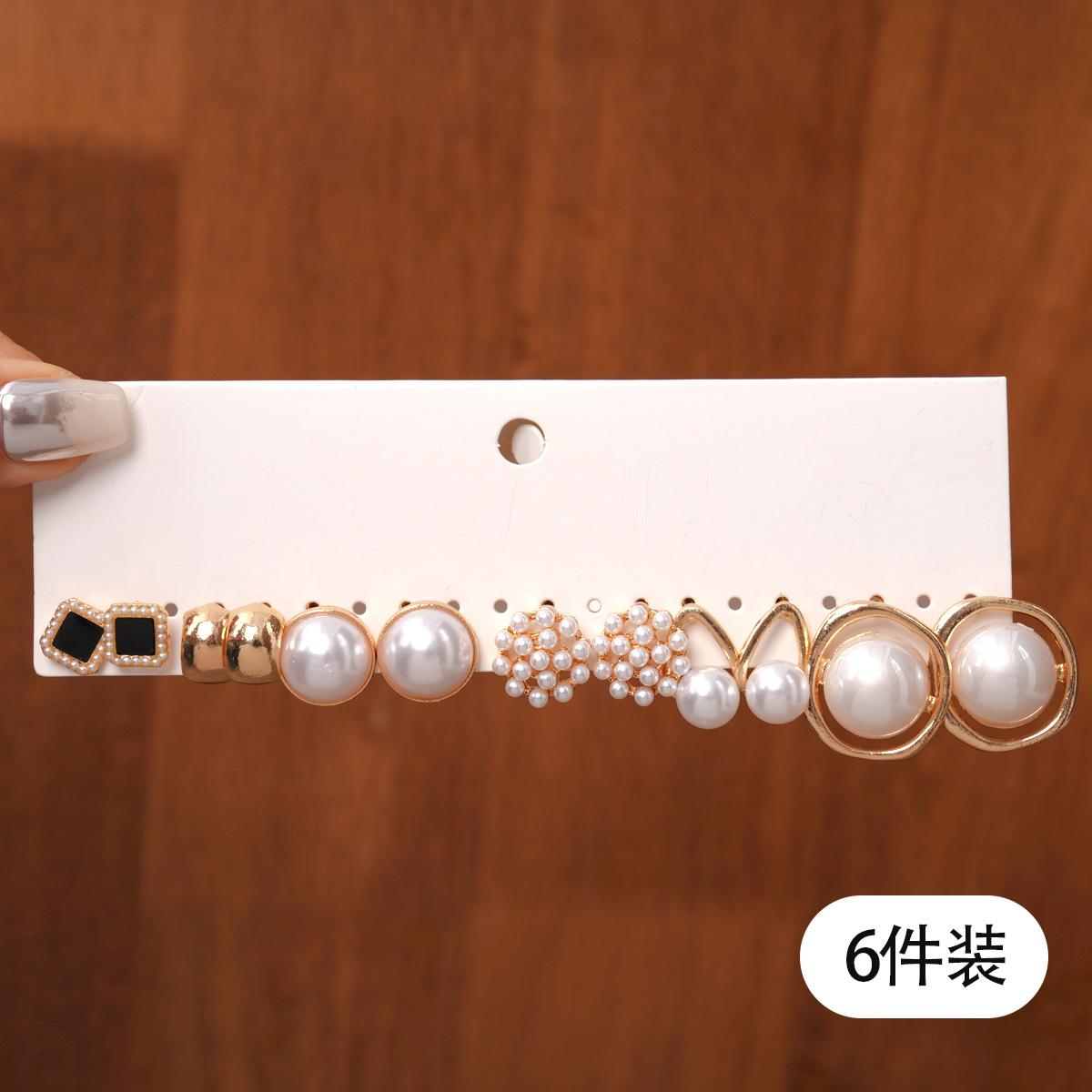 Twelve-piece imitation pearl round flower silver needle earrings fashionable commuter earrings