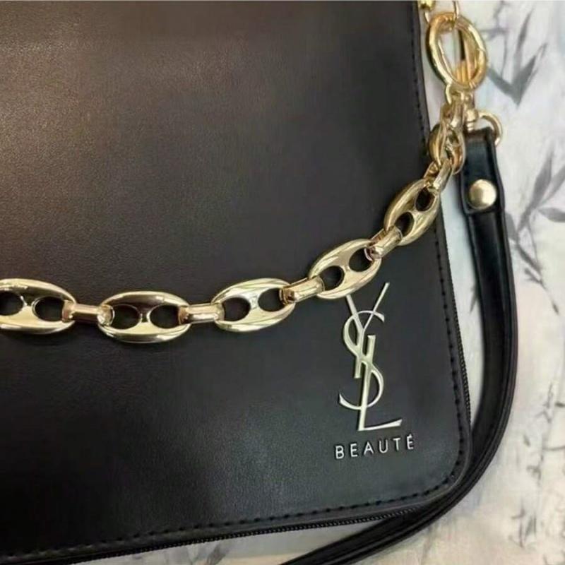 YSL black makeup crossbody bag with chain detailing, portable design, and large capacity, suitable for everyday use and travel.