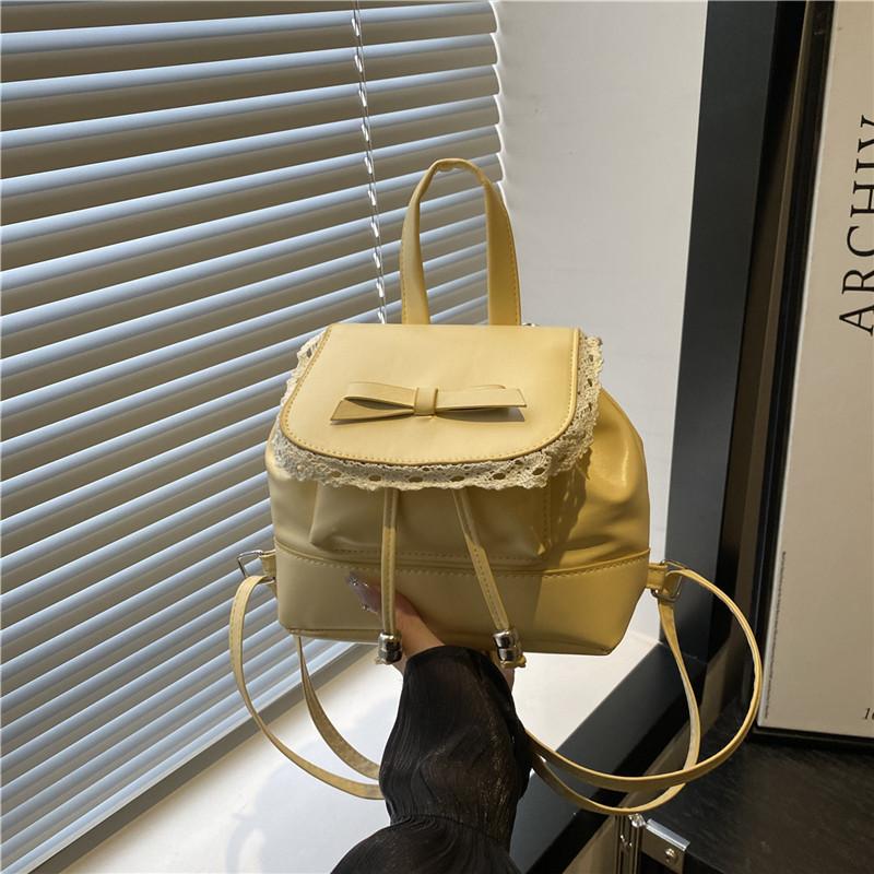 

New summer retro beautiful lace edge solid color fashion backpack niche high-end backpack women жовтий