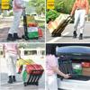 Compact Folding Hand Truck: Portable Four-Wheel Small Trailer Cart for Travel, Shopping, and Luggage Transport.