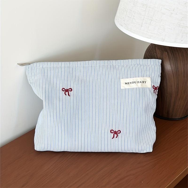 

Light Blue Striped Bow Cosmetic Bag, Women Travel Makeup Organizer with Zipper, Multi-Use Toiletry Pouch