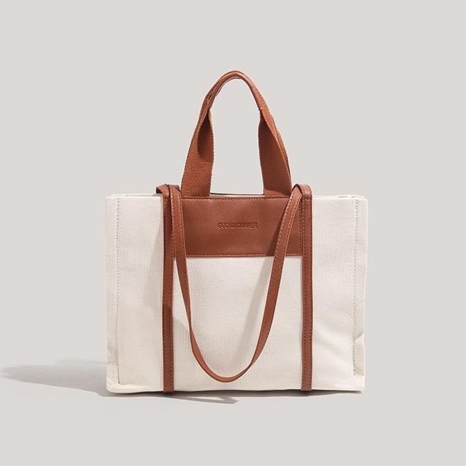 

Portable canvas large bag women s large-capacity new high-end commuter shoulder bag fashion