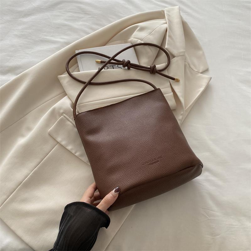 

Elegant Pu Leather Bucket Bag For Women With Soft Structure And Functional Inner Pocket Design коричневий