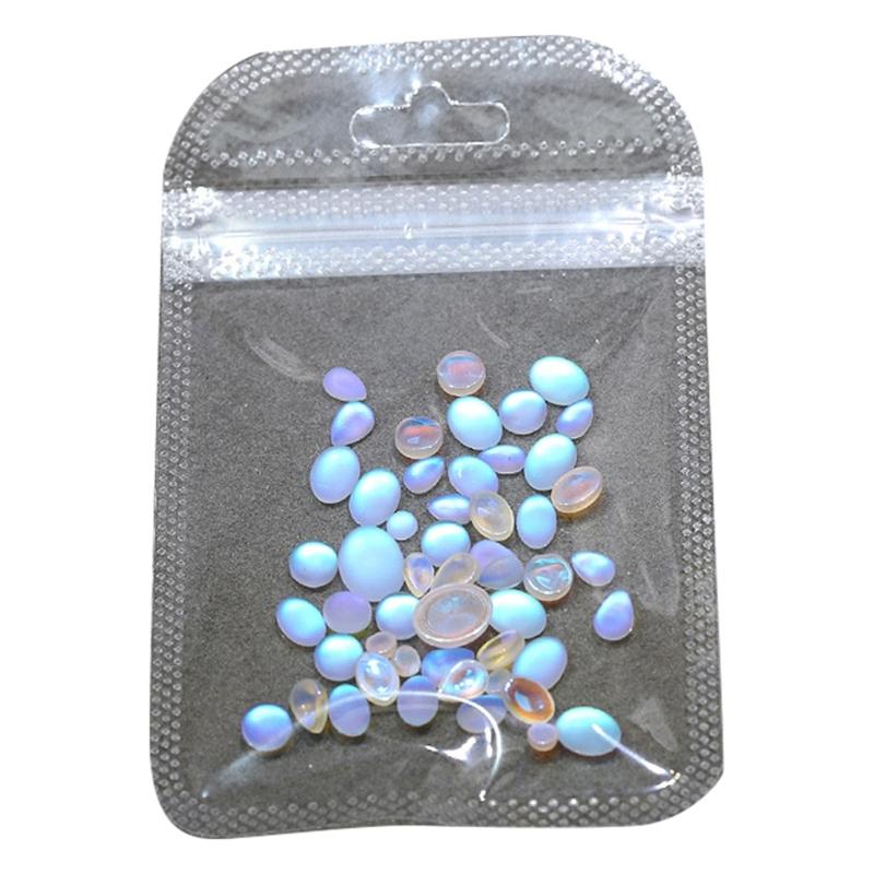 

50pcs Mixed Blue Tears Cats Eye Matte Gems Nail Charm Nail Accesory For Salon and Home Use Creative Fashionable Nail Art 1