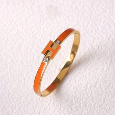 Gold Plated Orange Enamel H-Shape Charm Bangle with Crystal Accents