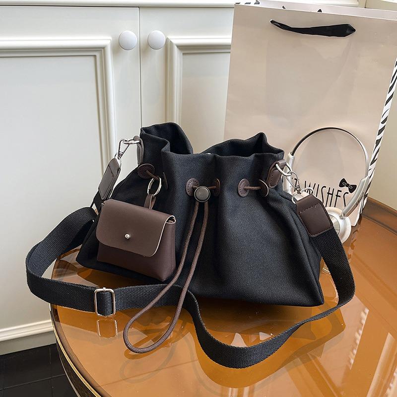 Canvas bag women's large-capacity new autumn and winter drawstring shoulder messenger bag premium pleated bucket bag