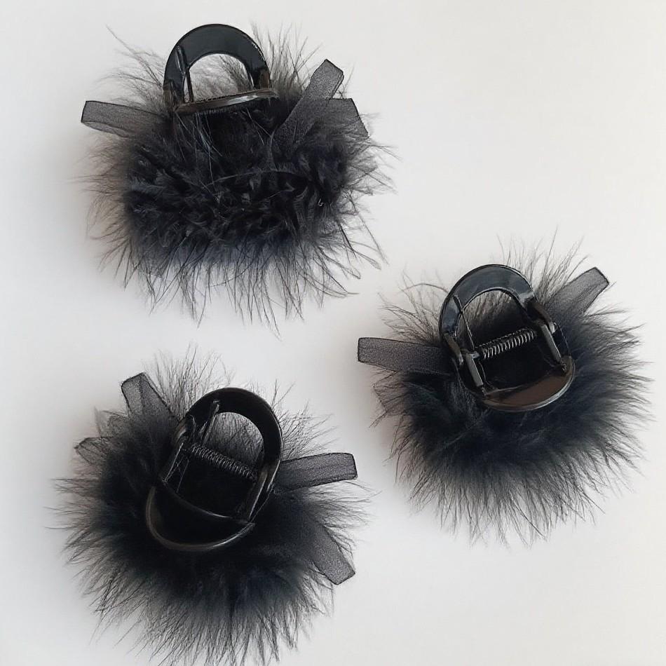 Eleganter Damen-Haarclip für mittellanges Haar mit Design aus schwarzen und kaffeefarbenen Federkrallen