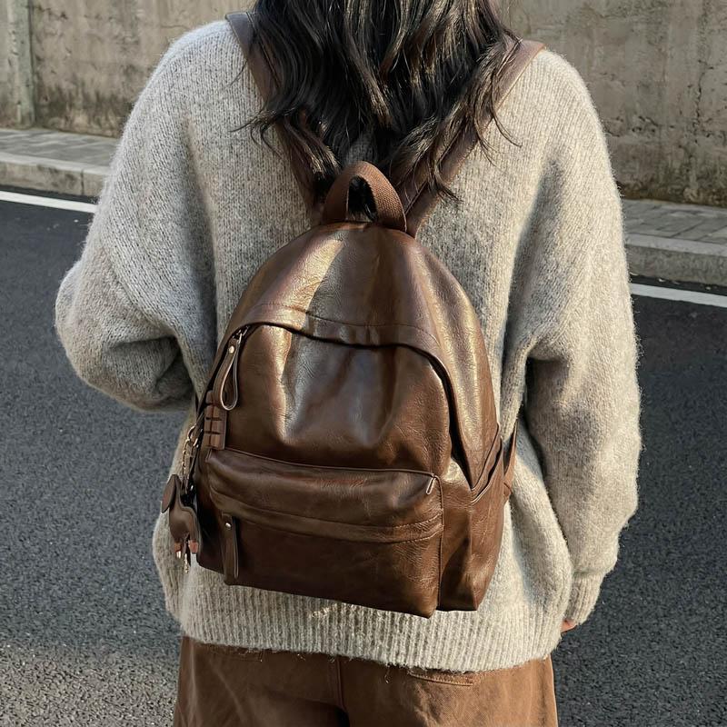Fashionable PU Leather Backpack with Adjustable Shoulder Straps Simple Design Suitable for Daily Use Travel Shopping and Other Scenarios No Pendant