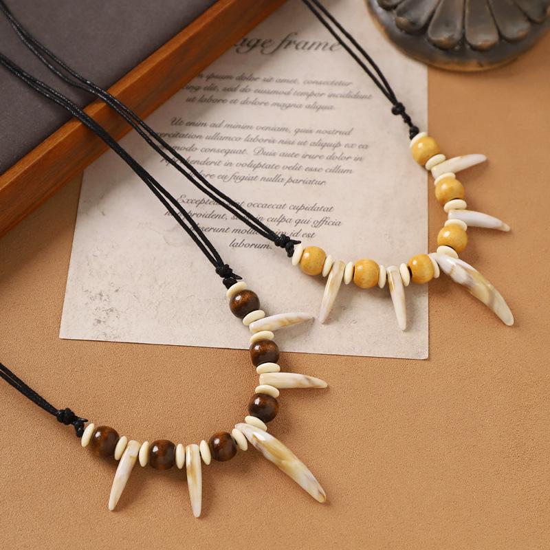 1 Stück Modisches Imitation Zähne Perlen Halskette Seil Geflochten Imitation Wolfszähne Halskette Surfer Verstellbare Länge Halskette Amulett