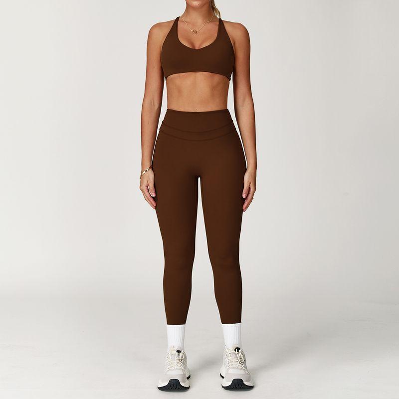 Guangzhou Zechuang Clothing Co., Ltd. Brushed Tight Back Yoga Suit Stretch High Waist Workout Clothes for Women Running