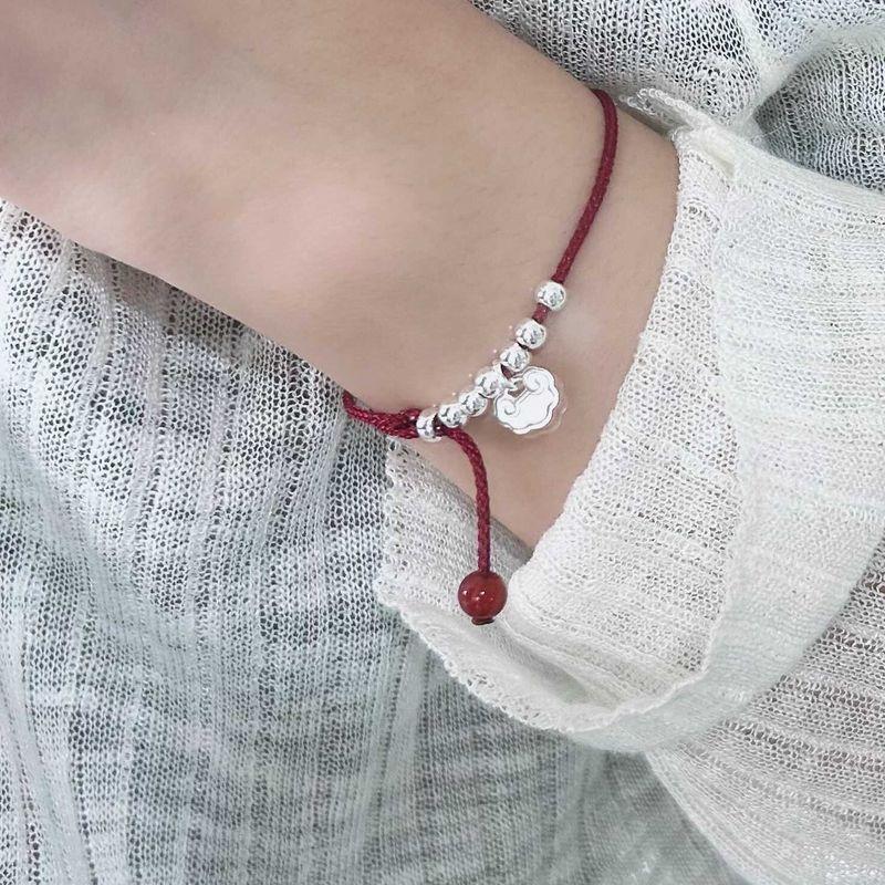 

Red Rope Original Design National Style Xiangyun Anklet Pure Silver A wine red rope bracelet