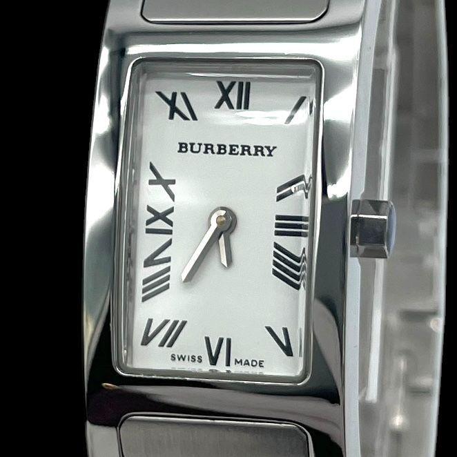 Used Very good condition, new battery, working item BURBERRY 1400L ladies watch rectangular quartz QZ 2 hands SS white dial silver Swiss made