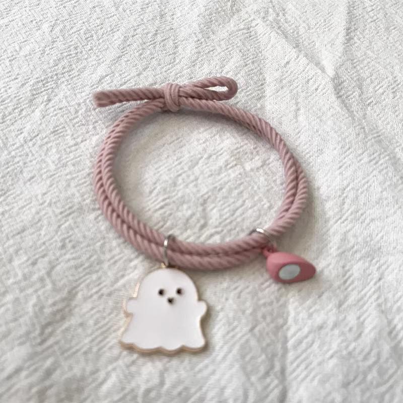 Czarno-białe bransoletki dla pary duchów z magnesem w kształcie serca - gumki recepturki na prezent dla chłopaka na Halloween.