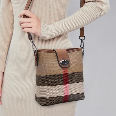 Sac seau à carreaux en cuir véritable nouveau été polyvalent niche haut de gamme sac bandoulière épaule unique pour femmes