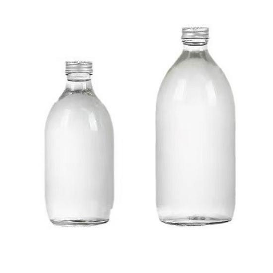 Transparent Round Glass Bottles with Lids for Juice, Milk, Tea, Cold Brew, and Coffee.