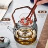 Pokaro Tea Heat-Resistant Glass Teapot, 1140ml, Integrated Steaming Function, Ink-Colored Design, Glass Tea Strainer, Wooden Handle, Stovetop Safe,