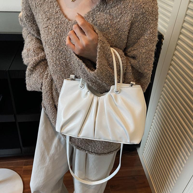 High-end niche bag women's autumn and winter 2025 new retro soft leather messenger bag women's hand-held pleated bucket bag