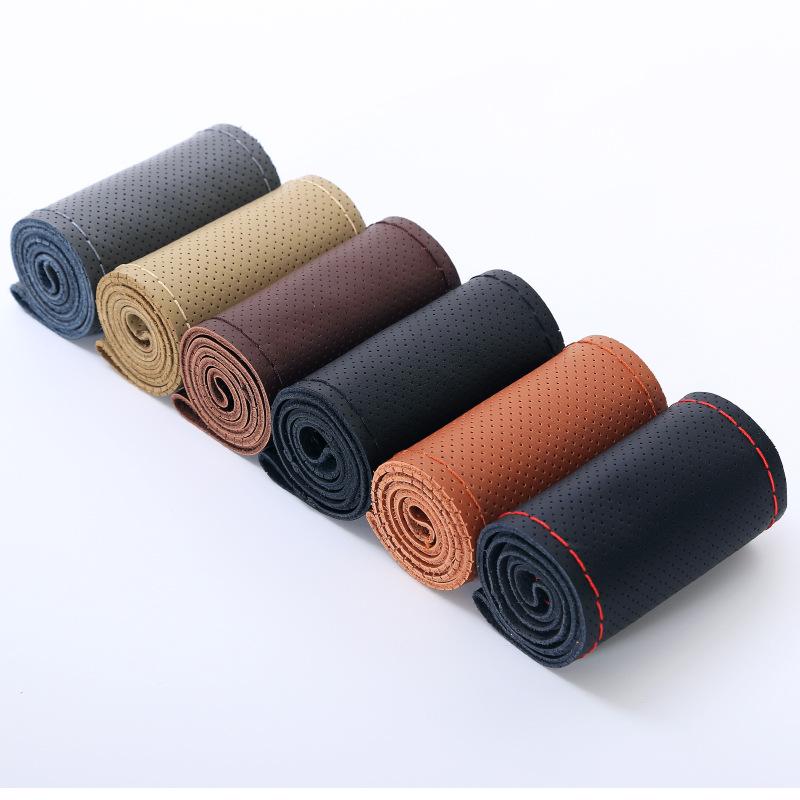 Ręcznie szyty pokrowiec na kierownicę z prawdziwej skóry bydlęcej, antypoślizgowy, oddychający, uniwersalny pasujący na każdą porę roku.