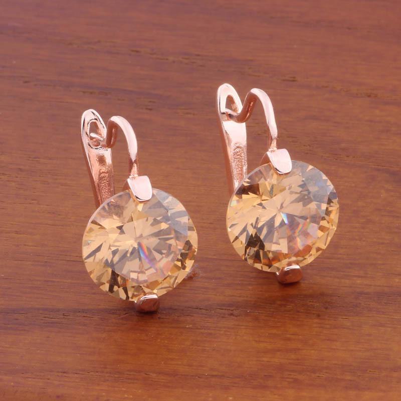 

2024 Европейская и американская мода летние серьги с круглым цирконием 12 мм шампанского