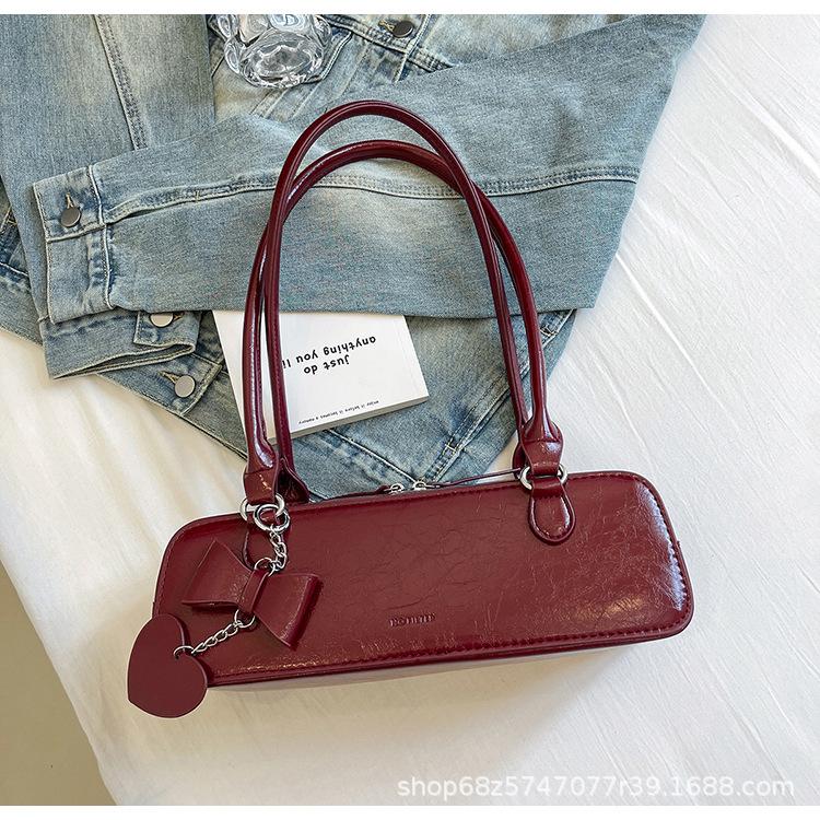 

French baguette bag niche design single shoulder underarm bag women s fashion bow pillow bag underarm bag