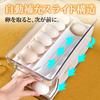 Egg tray for refrigerator, holds 24 eggs, automatic refilling, 2-tier design, sliding lid, convenient storage.