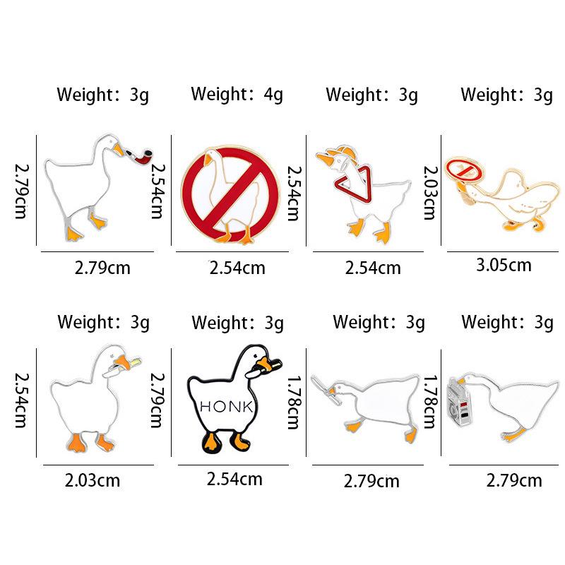 Charming Goose Pose Brooch: Cute Cartoon Animal Metal Badge with Drip Oil Finish.