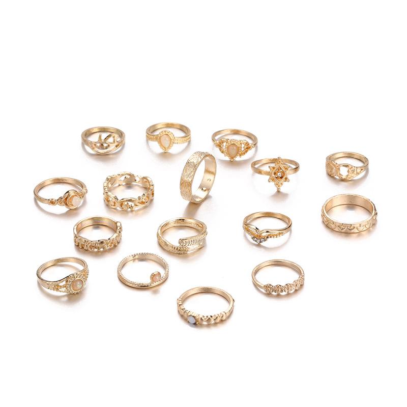 Modischer Opal Hohl Relief Elefant Mond Stern Kombination 16-teiliger Ring für Damen