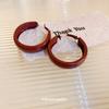 Silver needle dripping oil Ankola red pigment ring earrings niche exaggerated stud earrings high-end light luxury earrings