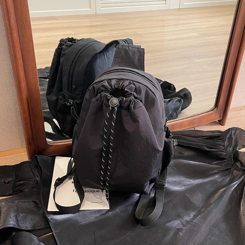 2025 new casual niche original design pleated drawstring bucket bag versatile sports shoulder backpack women s bag