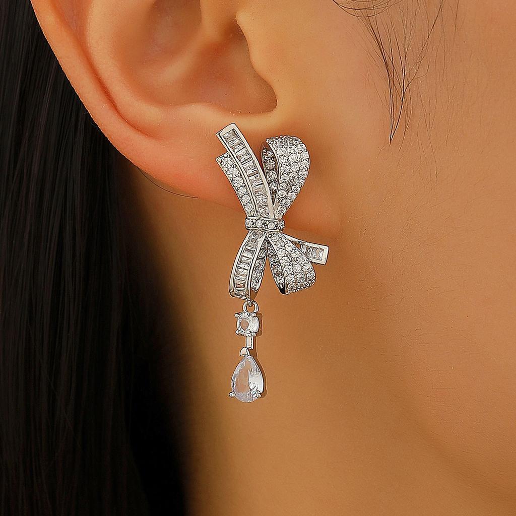 2025 Leichter Luxus High-End Voll-Diamant Schleife Wassertropfen Ohrringe ins Temperament vielseitig Internet-Berühmtheit personalisierte Ohrringe Ohrringe