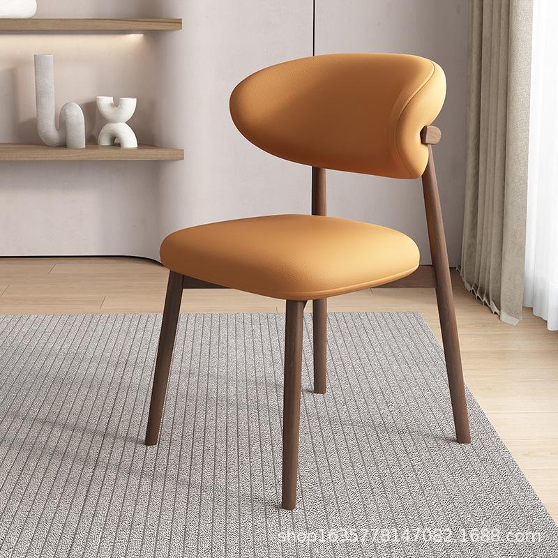 Nordic Modern Minimalist Solid Wood Dining Chair with Soft Pack Backrest - Comfortable Light Luxury Ram's Horn Design for Home, Restaurant, and Hotel.