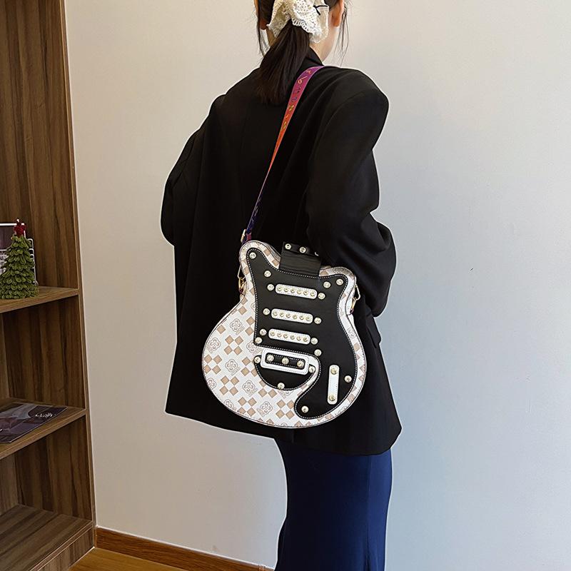 Personalized guitar bag 2025 new Korean version fashion rivet shoulder bag ins Internet celebrity women's backpack