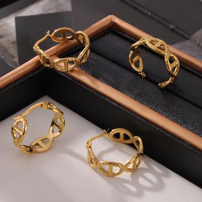 Pendientes geométricos de acero y titanio con diseño de nicho para mujer, con relieve retro francés, forma japonesa, chapados en oro de 18 quilates.