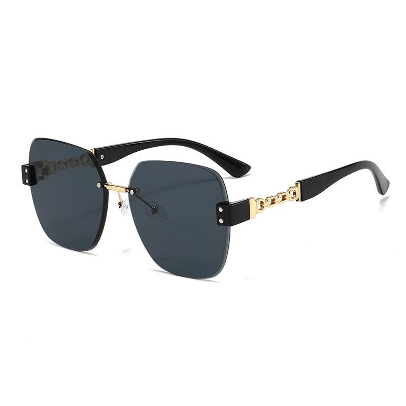 Internet celebrities big frame fashion chain glasses legs sunglasses women's new high-end sense thin European and American personality frameless sungl