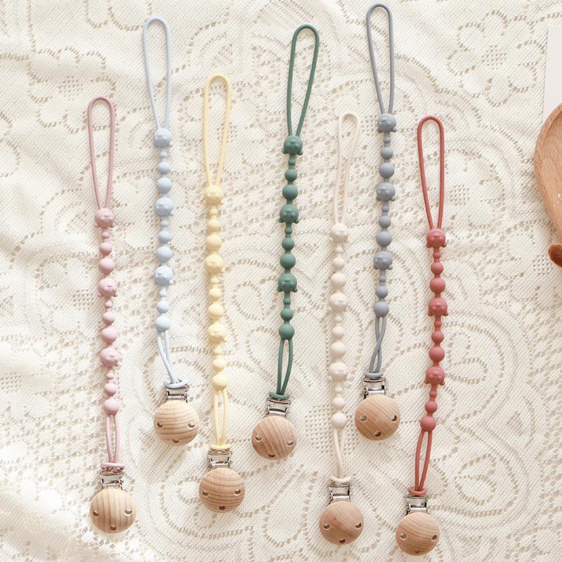 Solid Color Silicone Pacifier Chain Clips Baby Boys Girls Pacifier Gum Chain Bite Music Teeth Grinding Stick Toy Anti Loss Rope