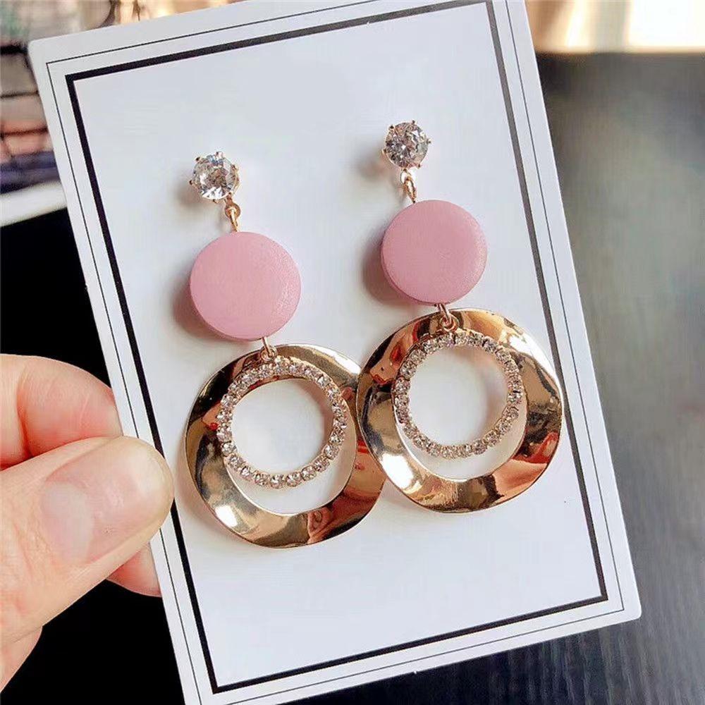 

Женские длинные круглые серьги с кисточками с бриллиантами розовый