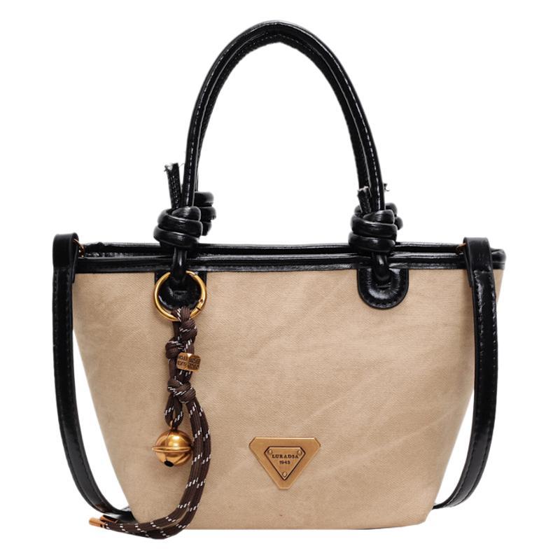 Retro new design light luxury fashionable portable bucket bag versatile high sense women commuter messenger bag