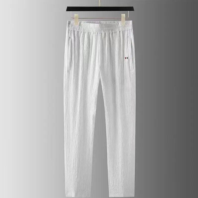 Verano   Conjunto de Dos Piezas para Hombre Moda Clásica Color Sólido Camisa de Manga Corta Pantalones Traje Deportivo Holgado Casual para Hombre 2026